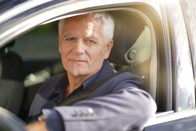 Senior man driving.